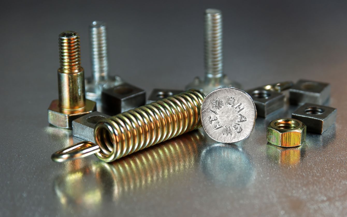 Zinc passivated hardware with mixed clear and yellow finishes