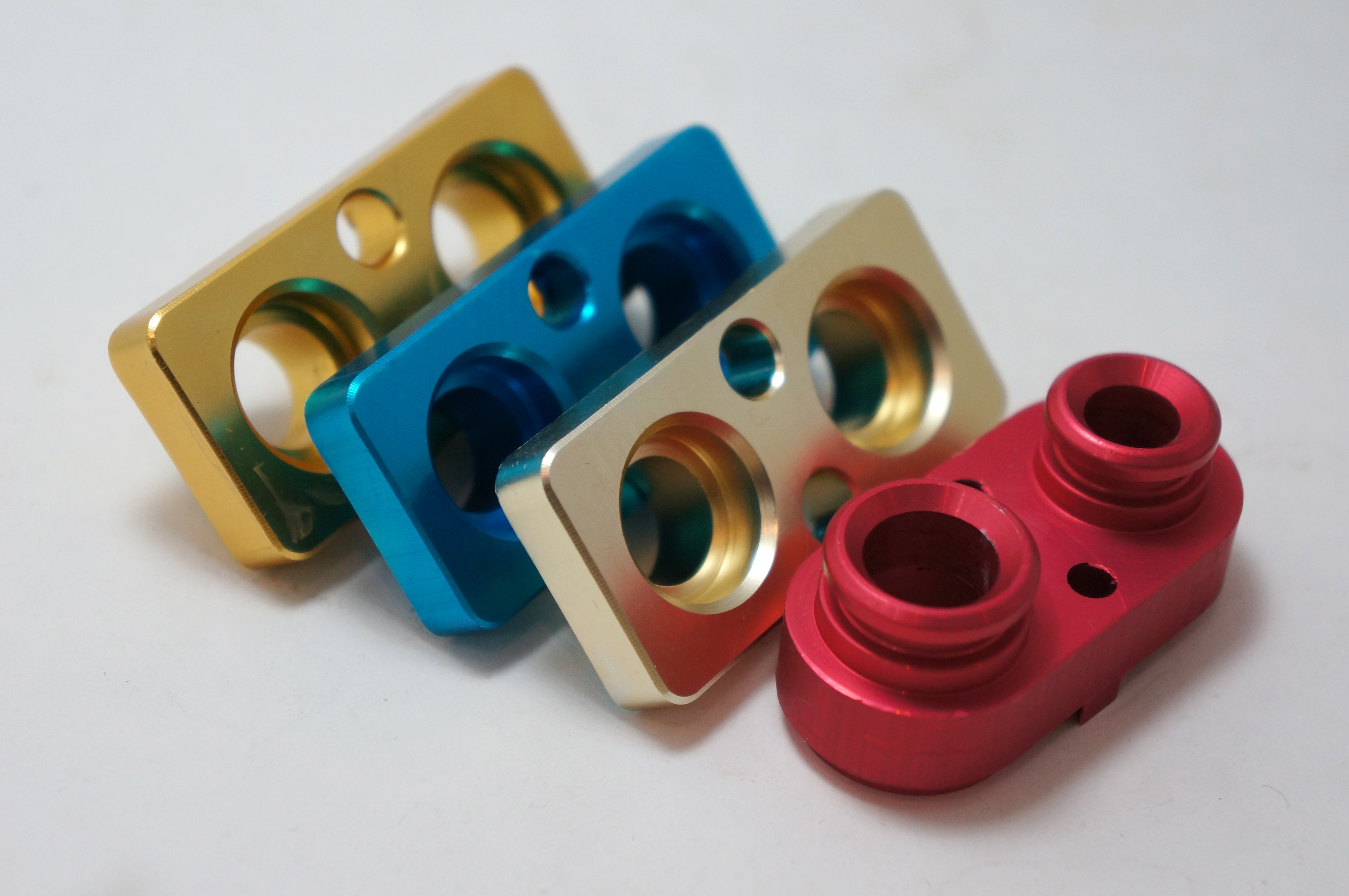 Machined aerospace fittings with finished surfaces and threaded features